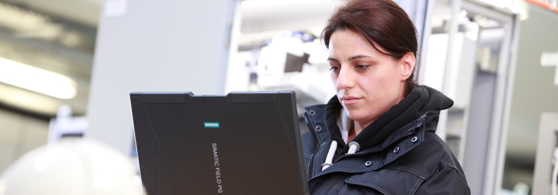 A BMA Automation employe looking at a screen